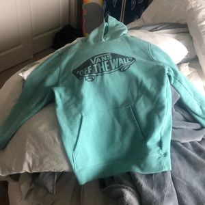 teal color vans off the wall